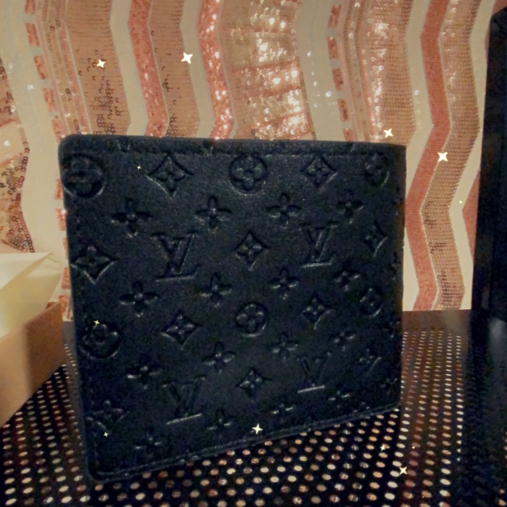 LV black bi-fold wallet